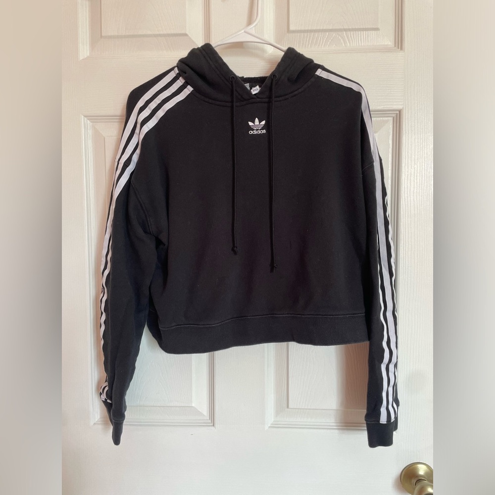 Adidas size small hoodie with white strips on each arm